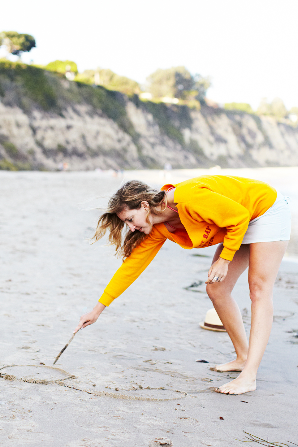 Beach_Woman_Writing_on-Sand_Malibu